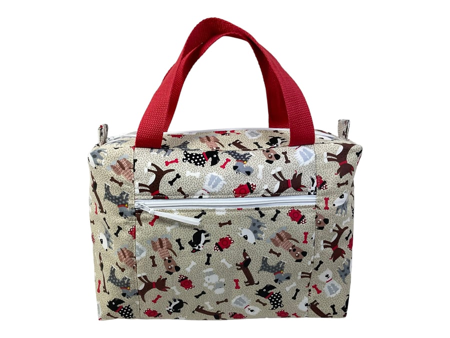 Large wash bag in dog print, toiletries bag with handles and pocket.