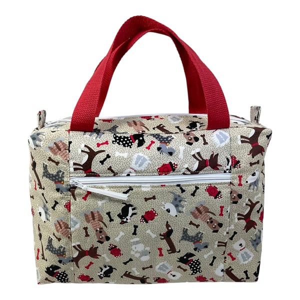 Large wash bag in dog print, toiletries bag with handles and pocket.