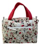 Large wash bag in dog print, toiletries bag with handles and pocket.
