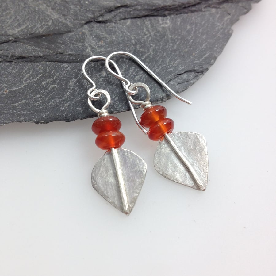 Silver and orange carnelian leaf spear earrings