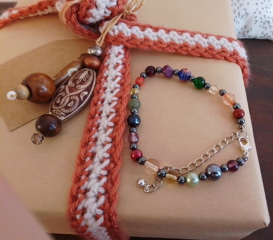 Handmade bracelet made using pre-loved beads.