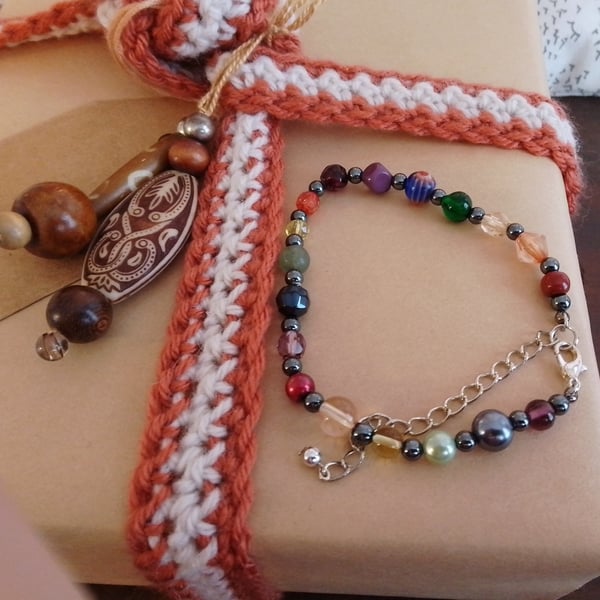 Handmade bracelet made using pre-loved beads.