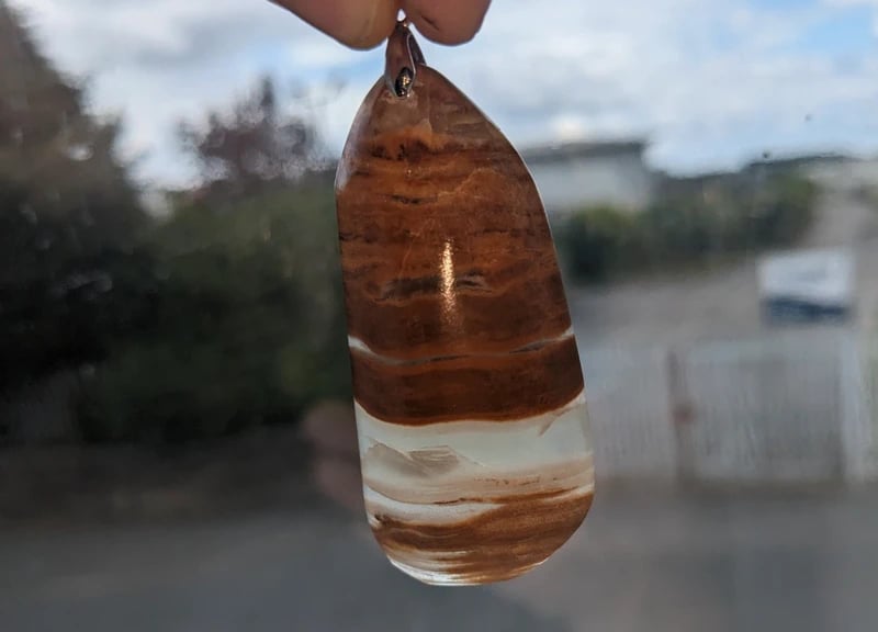 Hand-Polished Natural Mineral Pendant – Unique Banded Stone
