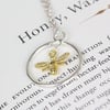 Silver and yellow gold bee pendant