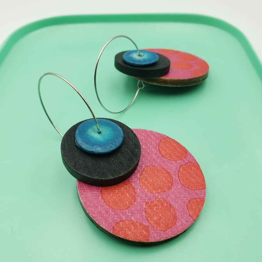 Big, bold and colourful earrings in red, pink, black and blue