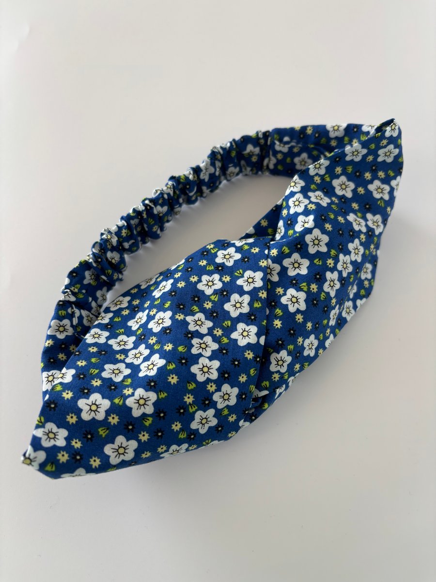 Cotton headband, twist knot style hairband in a blue and white floral print.