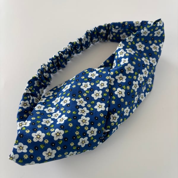 Cotton headband, twist knot style hairband in a blue and white floral print.
