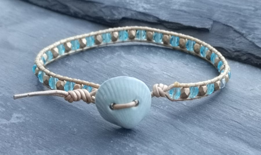 Gold leather and turquoise bead bracelet with ceramic shell button