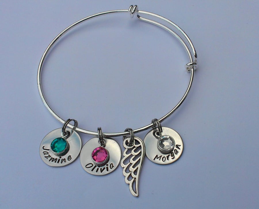 Hand Stamped personalised adjustable charm bangle bracelet with angel wing charm