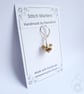 Tiny Glass Teddy Bear Stitch Marker - Image 1
