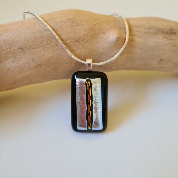 Fused glass black, silver and gold pendant