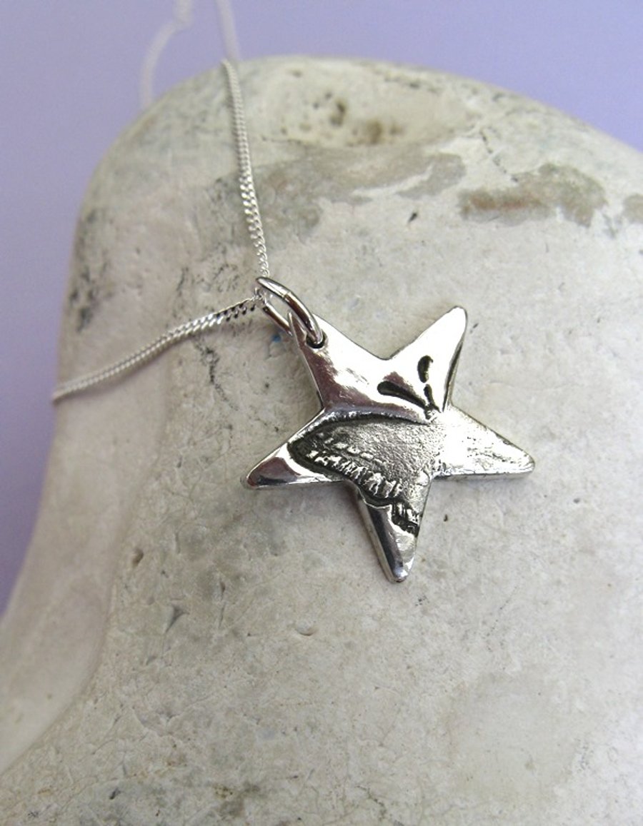 Butterfly star necklace in fine silver
