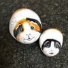 Guinea pigs hand painted pebbles rock art