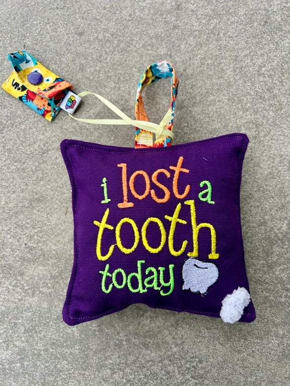 Purple “Monster” Tooth Cushion with mini Tooth Purse