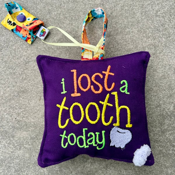 Purple “Monster” Tooth Cushion with mini Tooth Purse