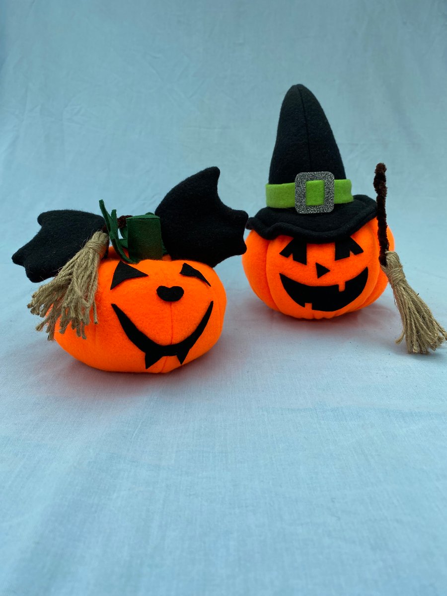 Halloween Decoration, Bright Orange Pumpkins, Black Hat or Bat Ears. Broomstick