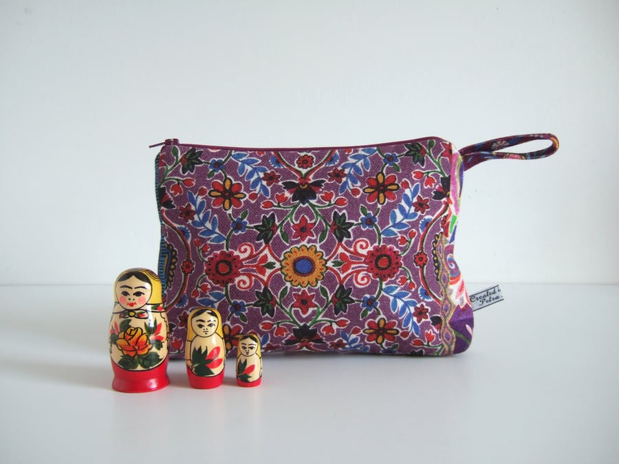 Craft sale Make up or toiletries bag made from a print with a Folk Art style.