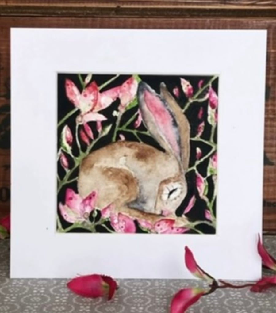 Mounted Original Resting Hare Rabbit surrounded by Pink Flowers Watercolour 