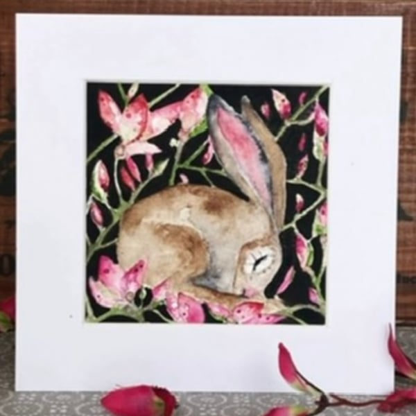 Mounted Original Resting Hare Rabbit surrounded by Pink Flowers Watercolour 
