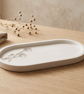 White Oval Catchall Tray With Flower Imprints  - Image 1