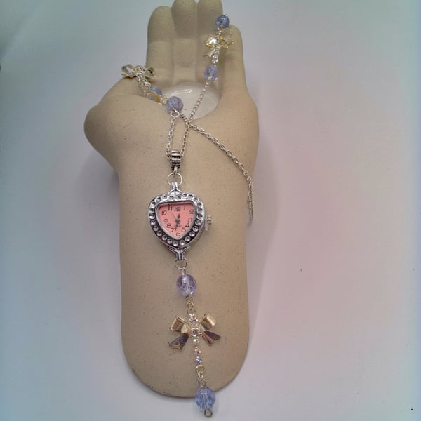 Heart Shaped Fob Watch on a Long Line Chain with Silver Bows and Lilac Crystals