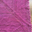 Hand knitted lamswool triangular scarf in hand dyed pink yarn
