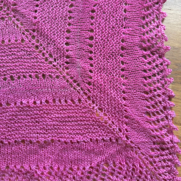 Hand knitted lamswool triangular scarf in hand dyed pink yarn