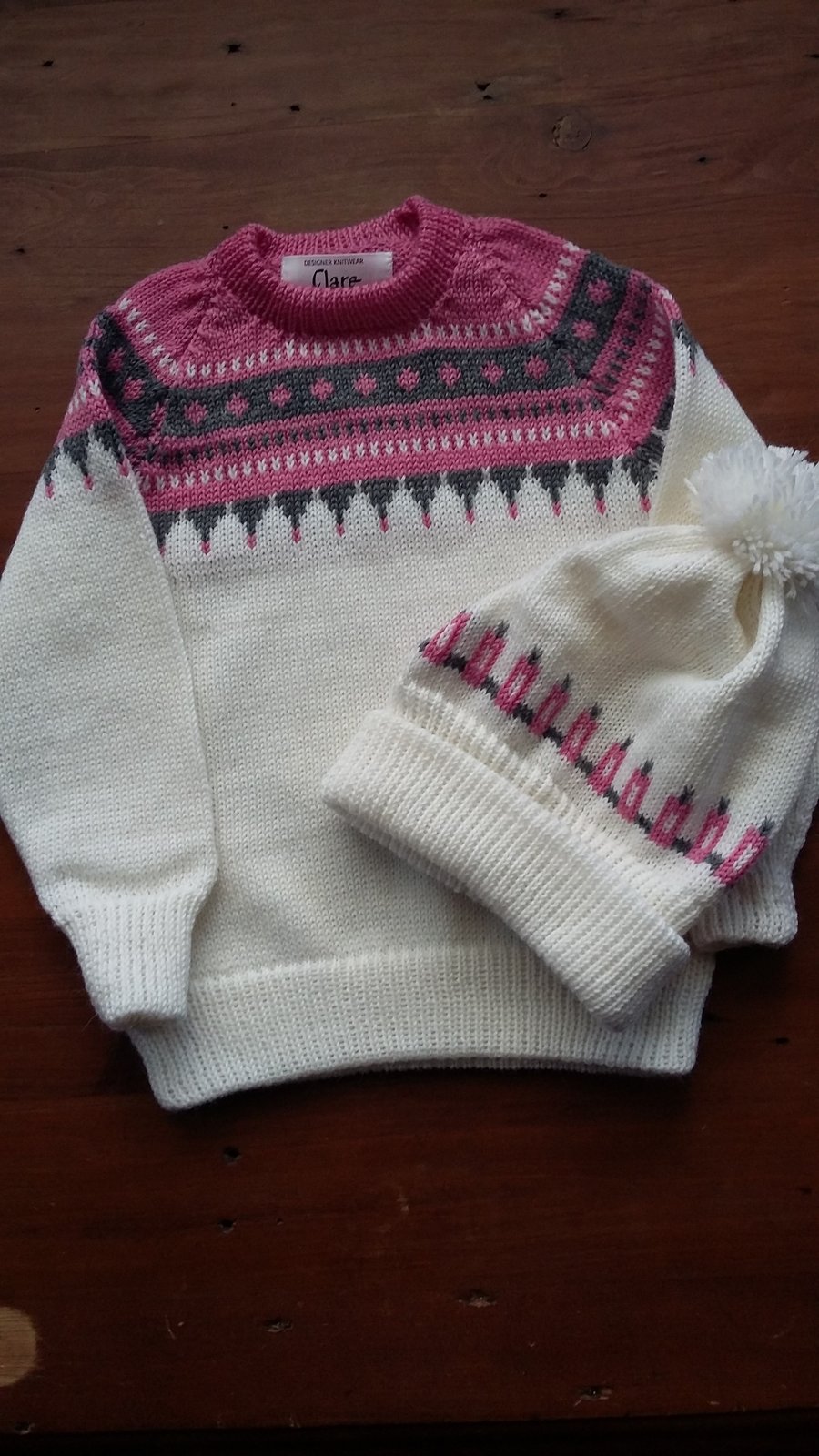 Fairisle yoke jumper in white, pink and grey with matching hat