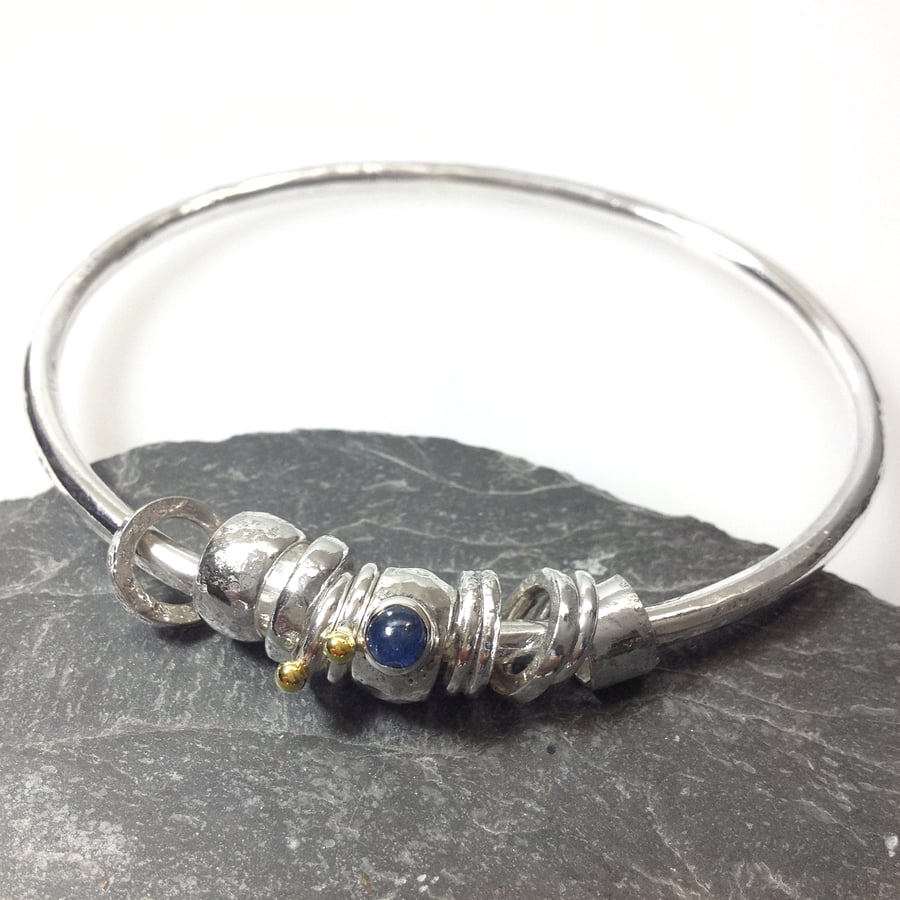  Silver sapphire and 18ct gold bangle