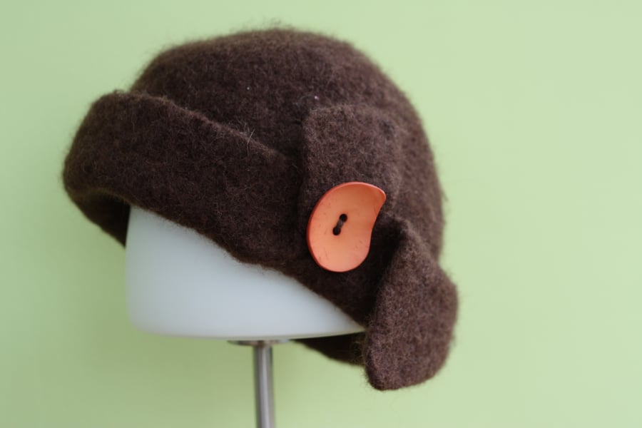 Modern cloche hat in brown, hand-knitted and felted
