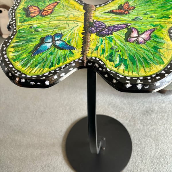A hand painted and sealed Butterfly side table by Andrew Jenkins 