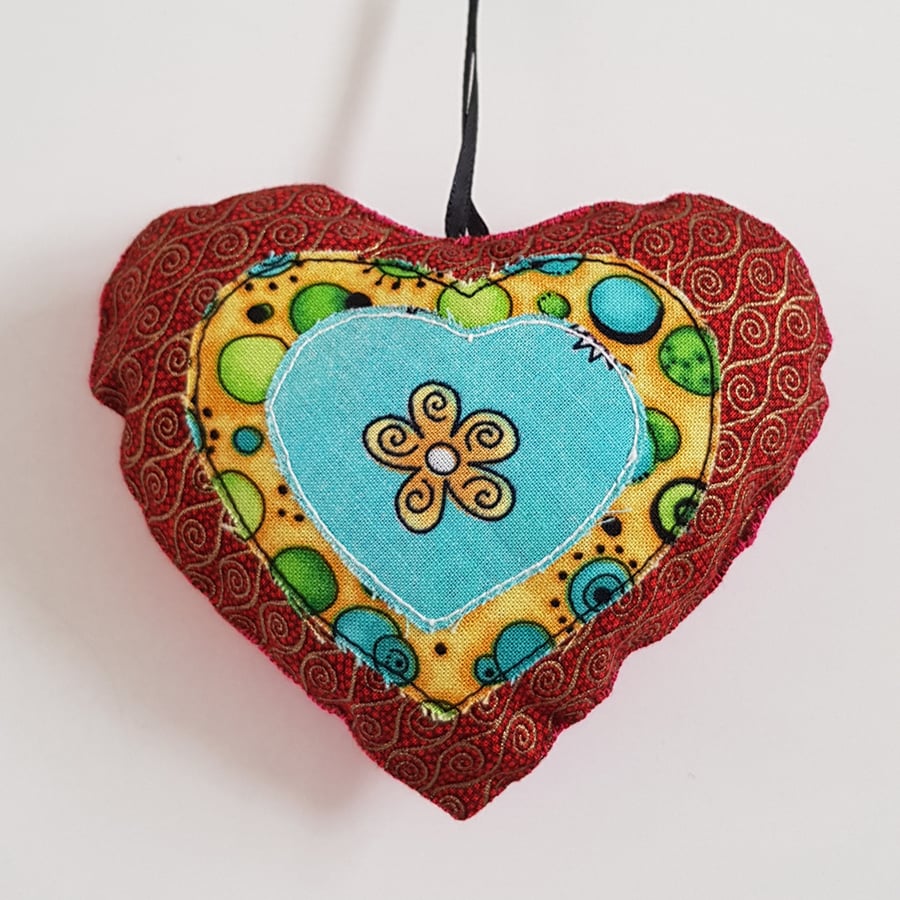 Swirly Red Heart Hanging Decoration with Turquoise Flower Centre