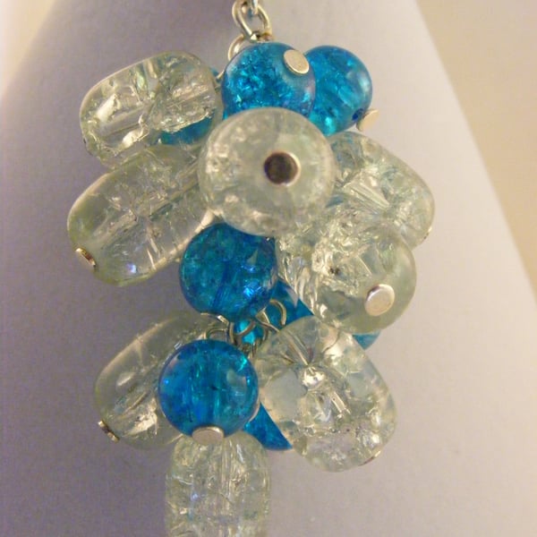 Turquoise and Clear Crackle Glass Bag Charm.