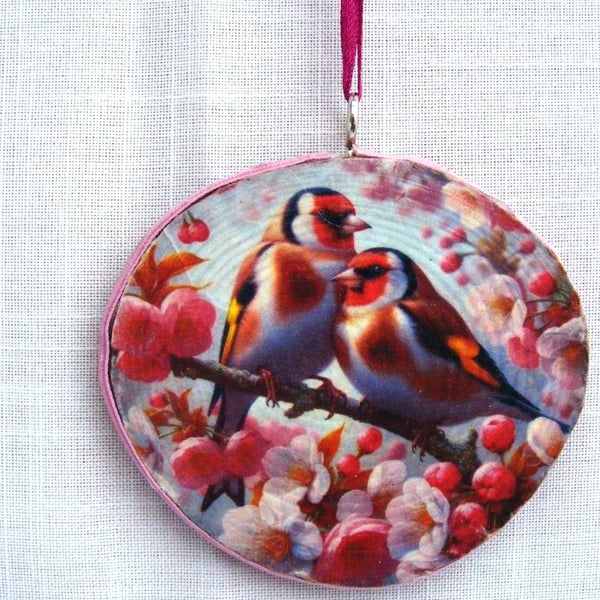 Goldfinches decoupage log slice wall decoration.