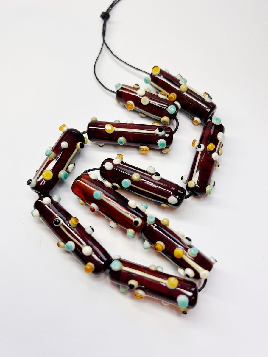 Handmade lamp work glass beads