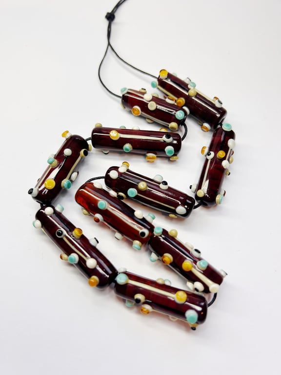 Handmade lamp work glass beads