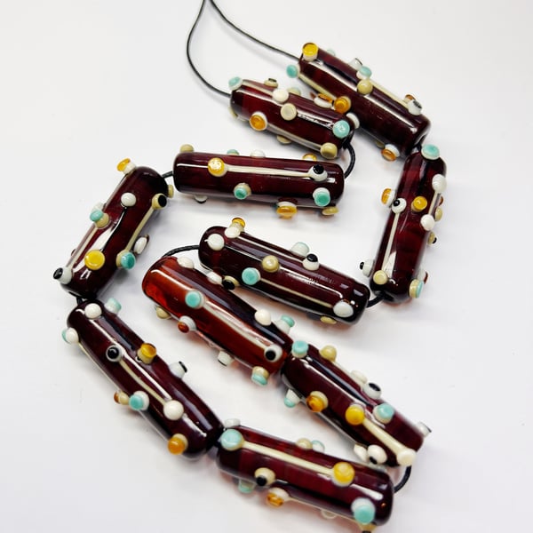 Handmade lamp work glass beads