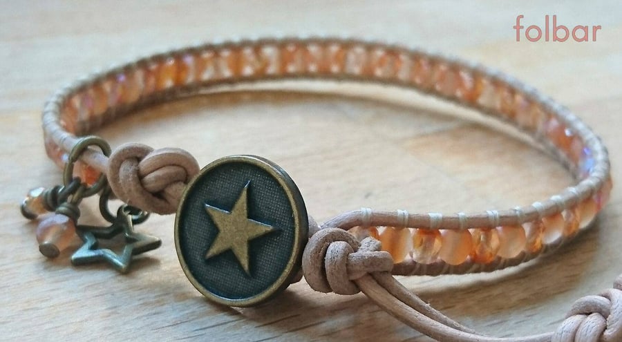 Tan leather and peach glass bead bracelet with star button 