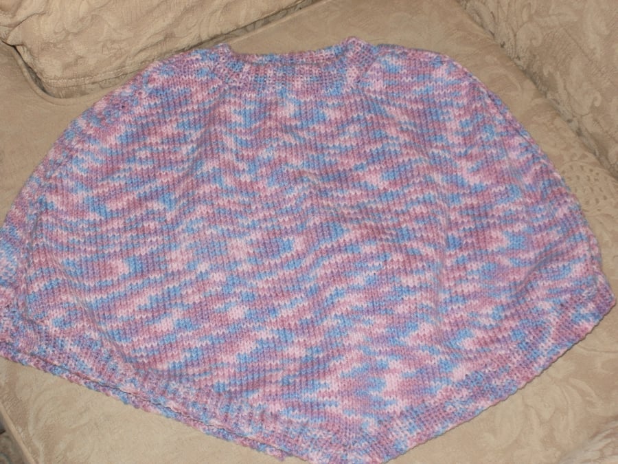 Hand knitted child's poncho