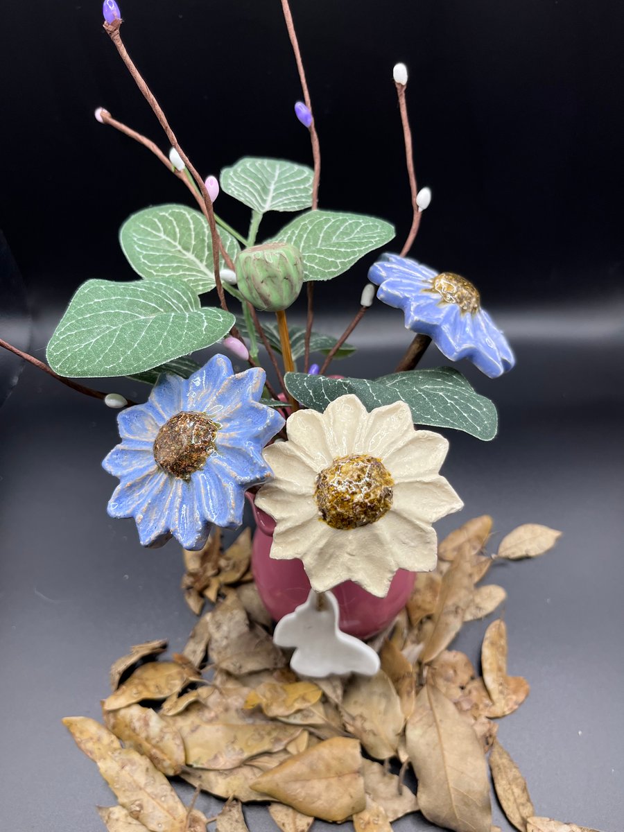 Vase of ceramic flowers 