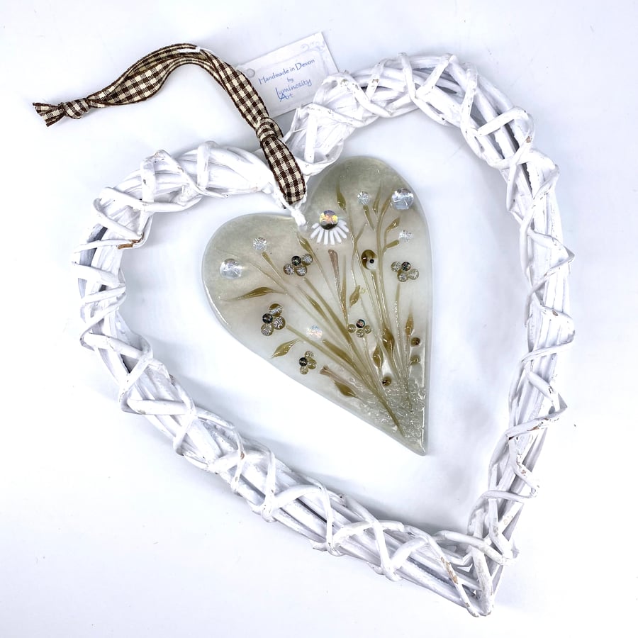 Glass & Wicker Heart with Delicate Flowers in Soft Sepia Tones