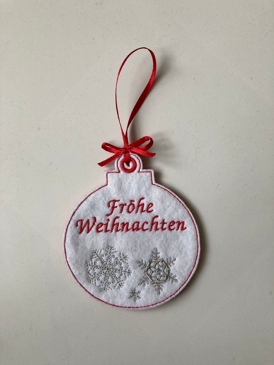 716. Frohe Weihnachten snowflake bauble.
