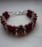 RED AND SILVER FLOWER BRACELET.  975 - Image 2
