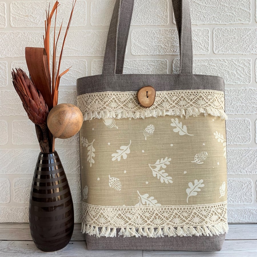Woodland tote bag with acorns print panel and tasselled lace trim