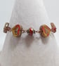 Rustic heart bracelet in red and dark yellow tones - Image 8