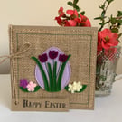 Easter greeting card with purple flowers. Handmade from wool felt.