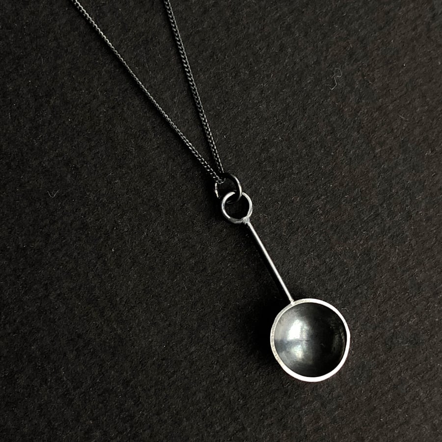Oxidised sterling silver spoon pendant.