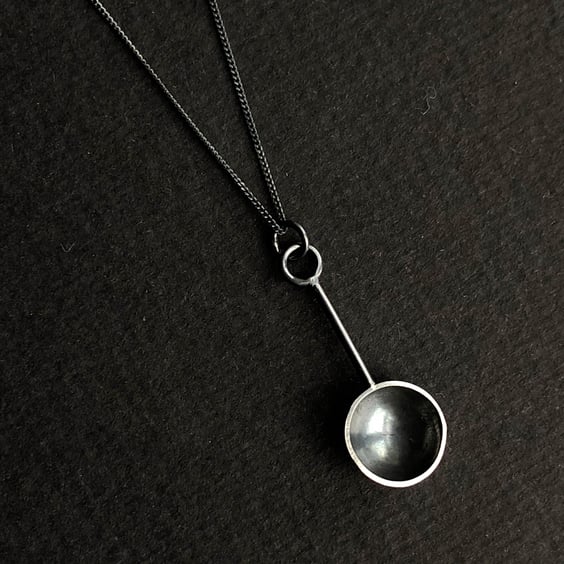 Oxidised sterling silver spoon pendant.