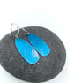 Turquoise anodised aluminium ammonite drop earrings - Image 3
