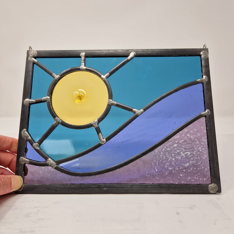 Stormy sky and ocean stained glass leaded panel